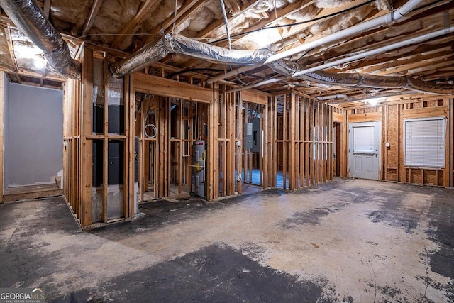 misc room featuring water heater and electric panel