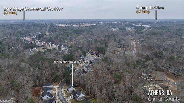 aerial view with a wooded view