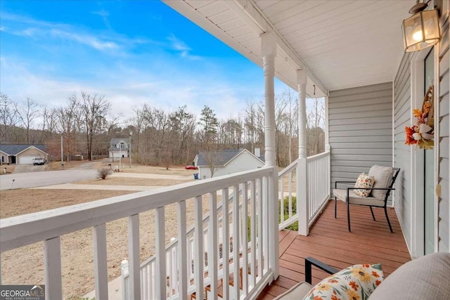 balcony featuring a porch