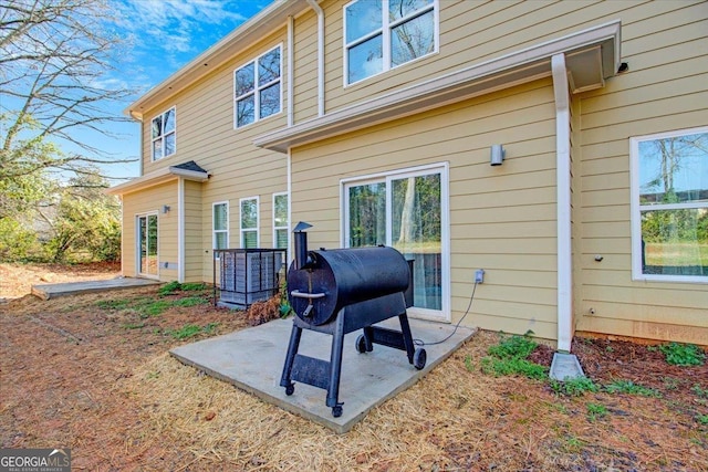 back of property featuring a patio