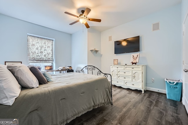 bedroom featuring ceiling fan and dark hardwood / wood-style flooring