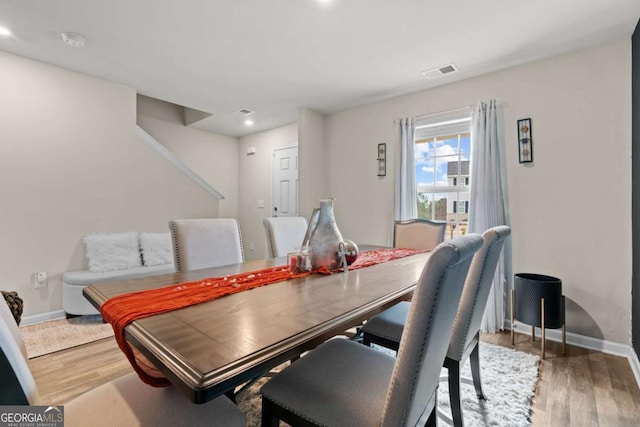 dining room featuring hardwood / wood-style floors