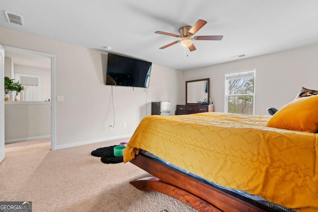 bedroom with ceiling fan and carpet