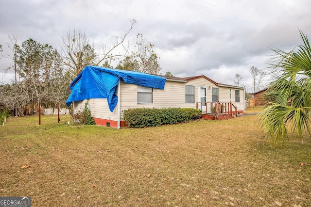 view of property exterior featuring a yard