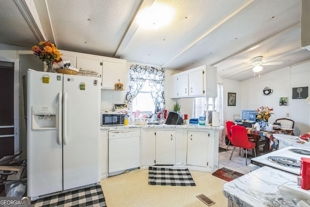 kitchen featuring ceiling fan, white cabinets, and white appliances