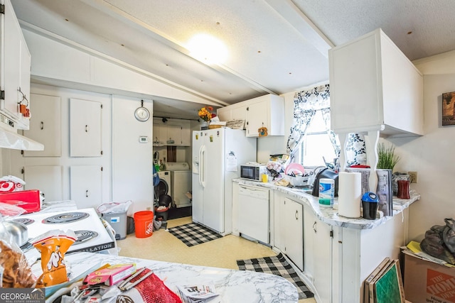 kitchen featuring white cabinetry, white appliances, separate washer and dryer, and vaulted ceiling