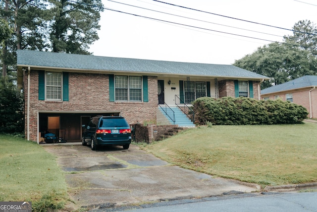 view of front of home featuring a garage and a front lawn