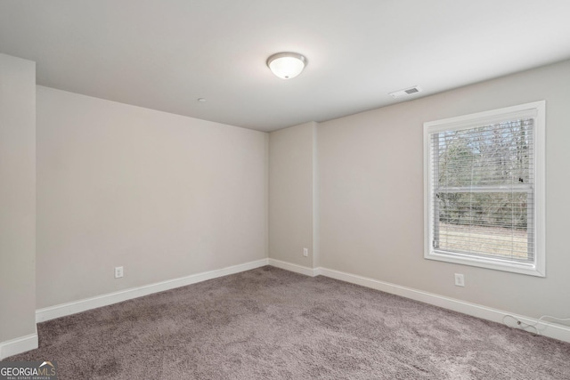 view of carpeted spare room