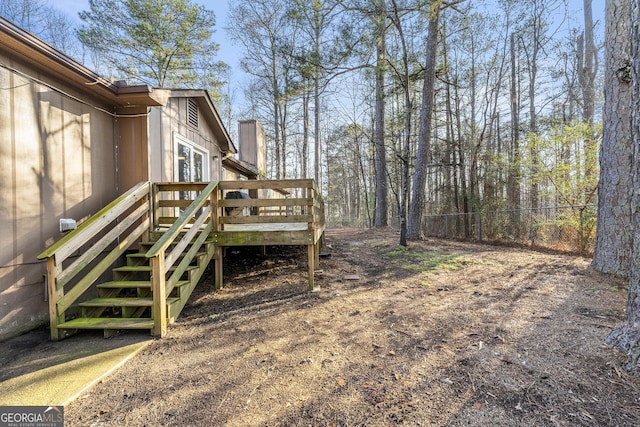 view of yard with a wooden deck