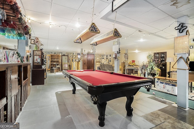 recreation room featuring pool table and a drop ceiling