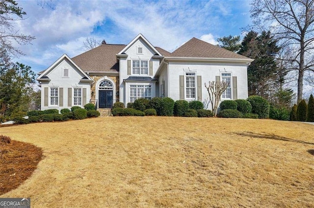 view of front property with a front lawn