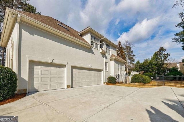 view of property exterior with a garage