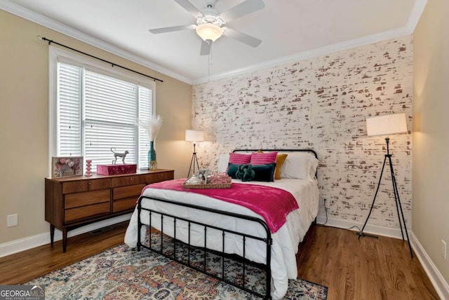 bedroom featuring crown molding, ceiling fan, and dark hardwood / wood-style flooring