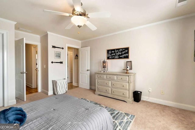 carpeted bedroom with crown molding and ceiling fan