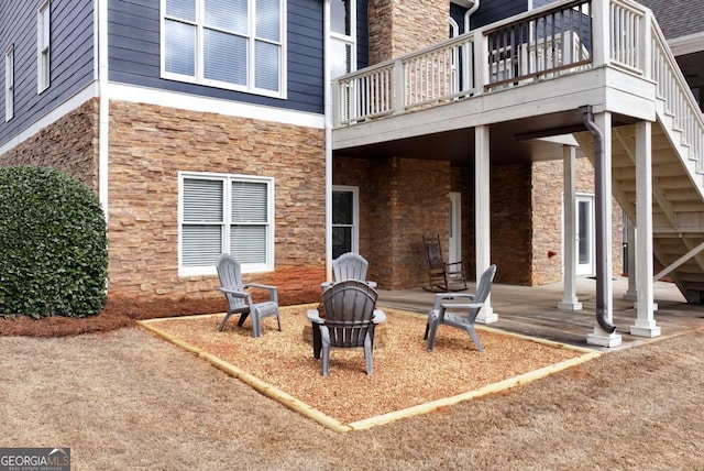 exterior space featuring a fire pit