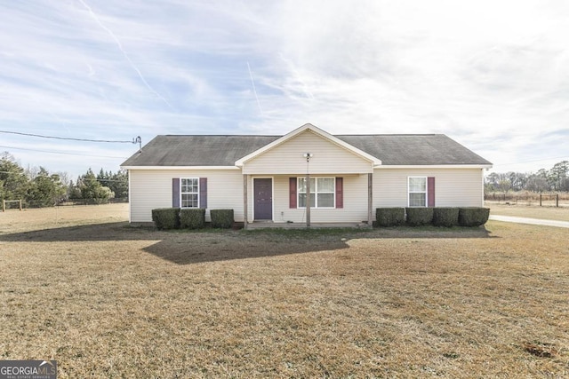 single story home with a front lawn and a porch