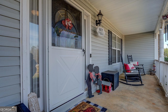 doorway to property with a porch