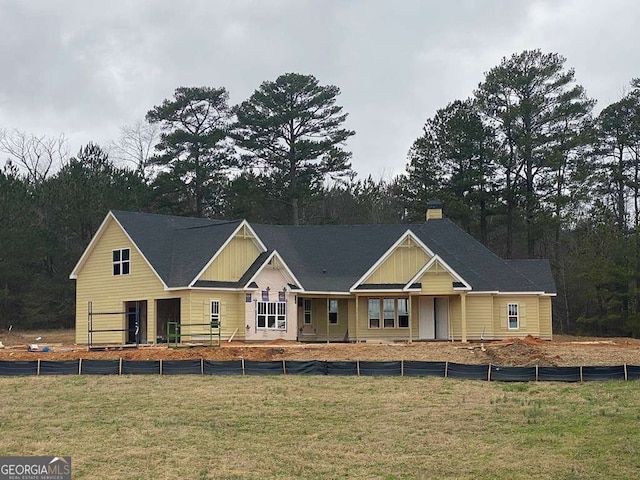 view of front of home with a front lawn