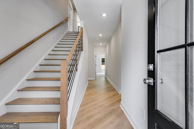 662 Lake Circle Rd, Buchanan, GA 30113 - stairway featuring recessed lighting, wood finished floors, and baseboards