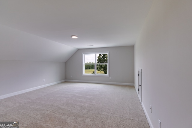 662 Lake Circle Rd, Buchanan, GA 30113 - additional living space featuring lofted ceiling, light colored carpet, and baseboards