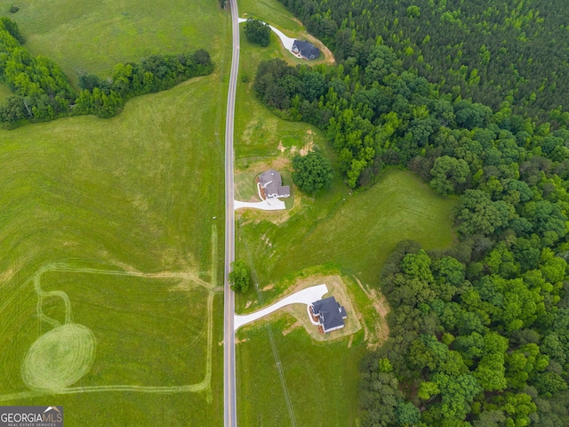 662 Lake Circle Rd, Buchanan, GA 30113 - aerial view of property and surrounding area with property parcel outlined and a heavily wooded area