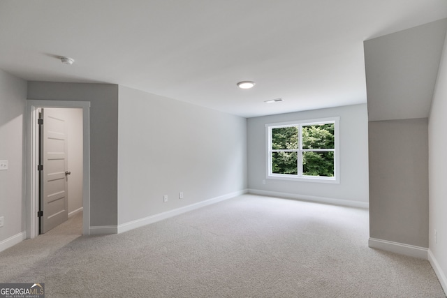 662 Lake Circle Rd, Buchanan, GA 30113 - spare room with carpet floors, baseboards, and a smoke detector