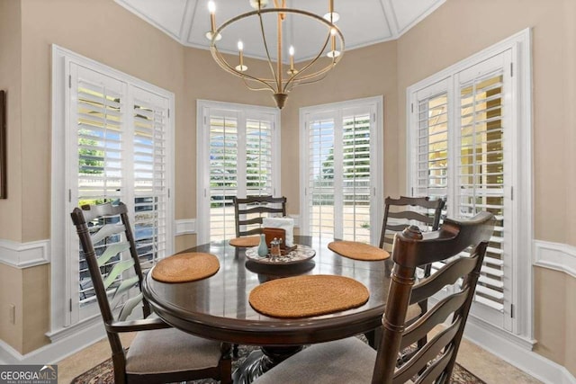 dining room featuring an inviting chandelier and ornamental molding