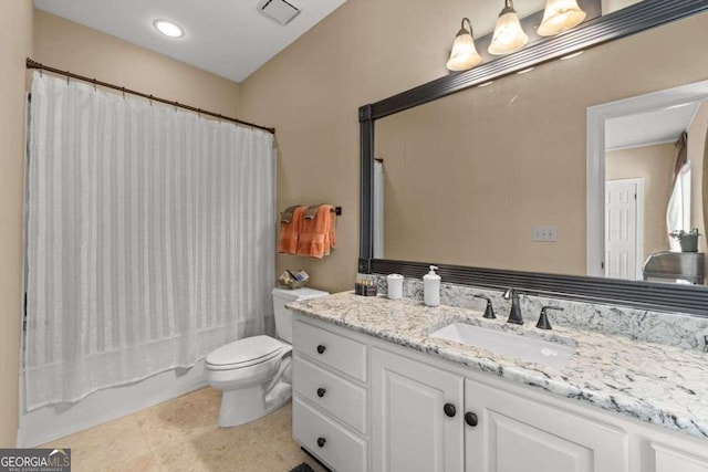 full bathroom with vanity, shower / bath combination with curtain, tile patterned floors, and toilet