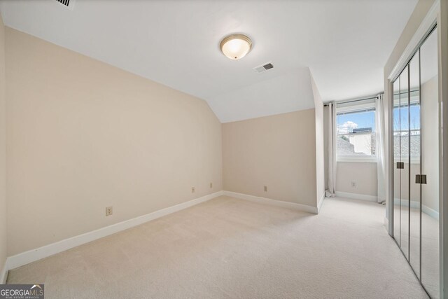 sitting room featuring light colored carpet and ceiling fan