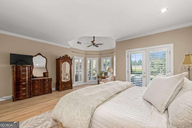 bedroom with access to exterior, crown molding, french doors, and light wood-type flooring