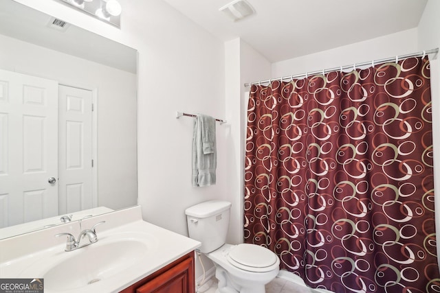 248 Allegrini Dr, Atlanta, GA 30349 - bathroom with toilet, vanity, visible vents, and tile patterned floors