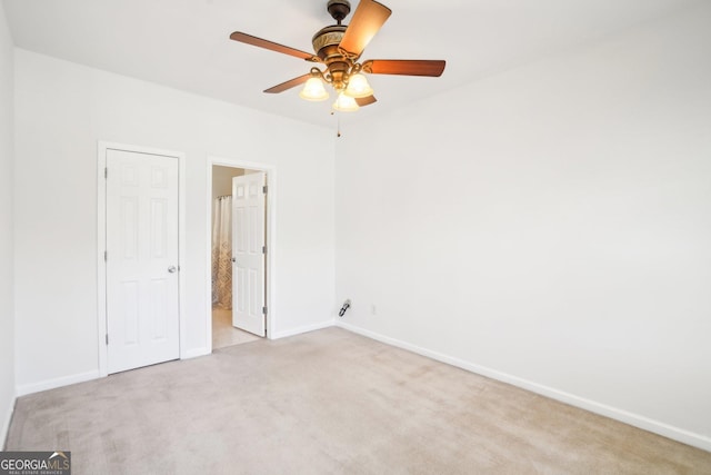 248 Allegrini Dr, Atlanta, GA 30349 - spare room with light carpet, baseboards, and a ceiling fan