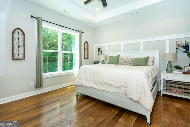 bedroom featuring recessed lighting, dark wood finished floors, visible vents, and baseboards