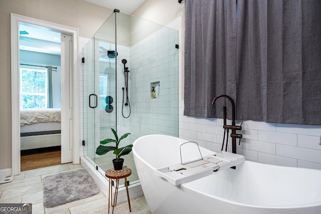 102 Landings Way, Lagrange, GA 30240 - bathroom with a soaking tub, a shower stall, and connected bathroom