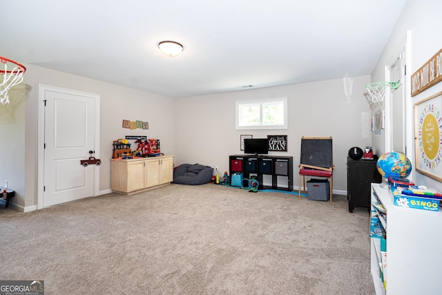 playroom with baseboards and carpet flooring