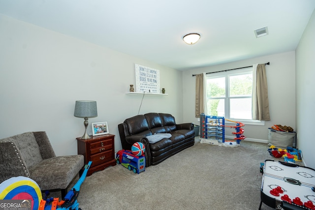 102 Landings Way, Lagrange, GA 30240 - carpeted living room featuring baseboards and visible vents