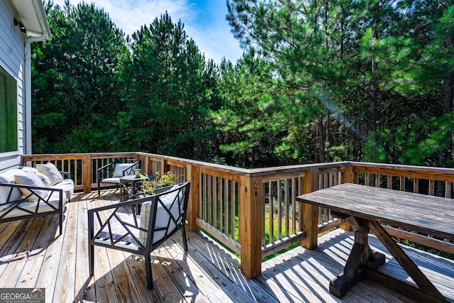 deck featuring an outdoor living space