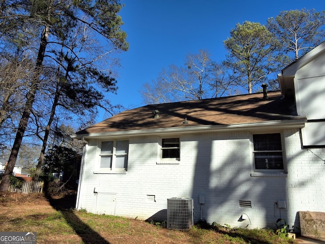 view of home's exterior featuring central AC unit