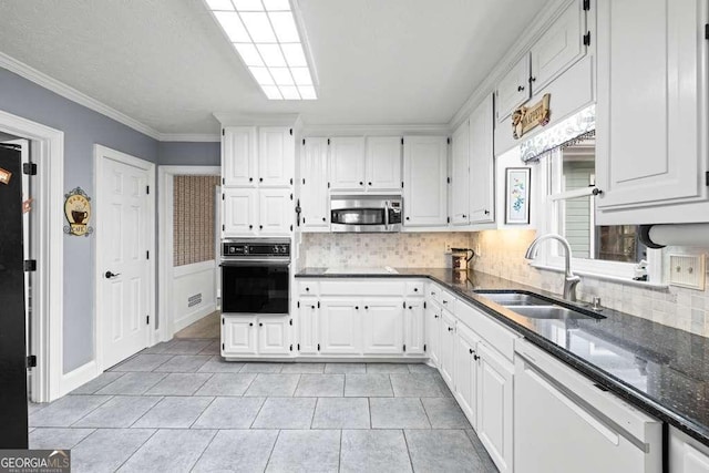 kitchen featuring white cabinets, sink, black oven, and white dishwasher