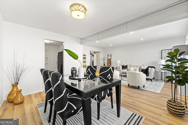 dining room featuring hardwood / wood-style flooring