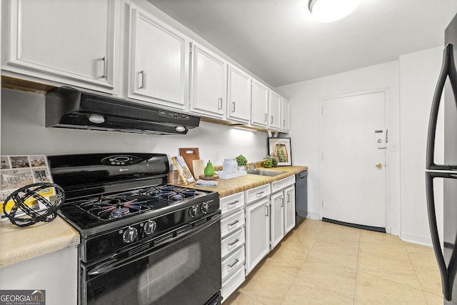 kitchen featuring sink, white cabinetry, black appliances, light tile patterned floors, and exhaust hood