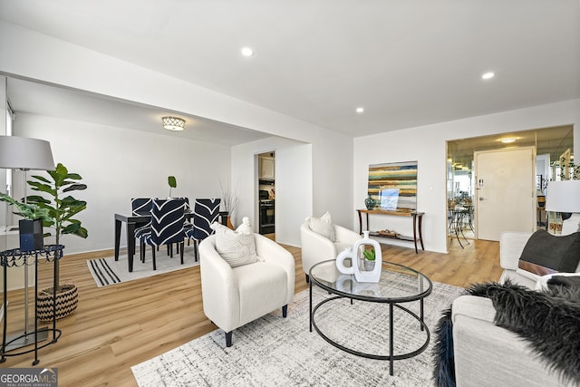 living room with light hardwood / wood-style floors