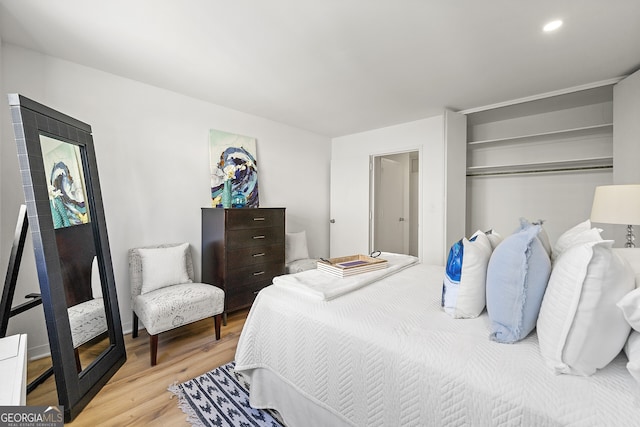 bedroom featuring light wood-type flooring