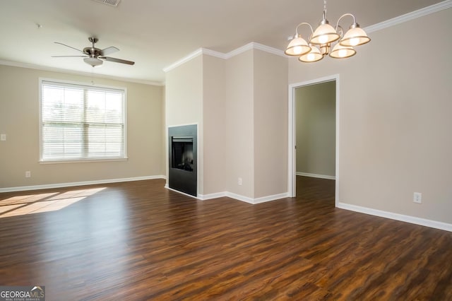 unfurnished living room with dark wood-type flooring, crown molding, and ceiling fan with notable chandelier