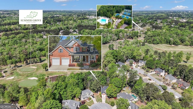 birds eye view of property featuring view of golf course and a residential view