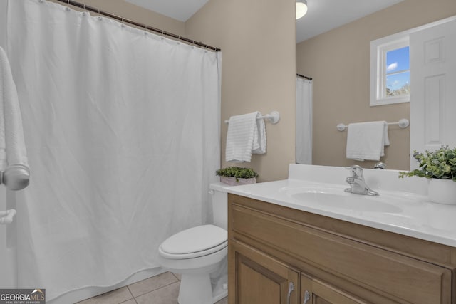 full bath featuring toilet, a shower with shower curtain, tile patterned flooring, and vanity