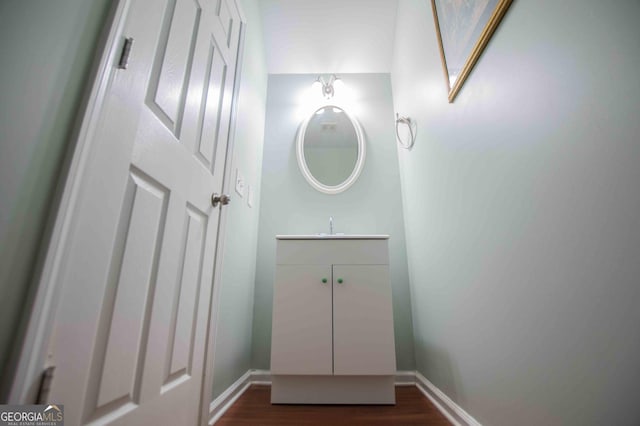 bathroom featuring vanity and hardwood / wood-style floors