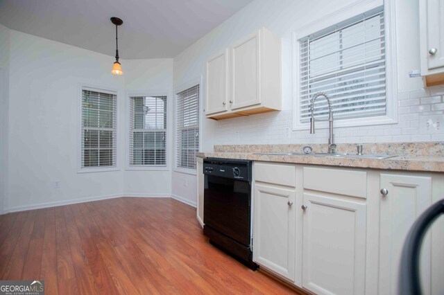 living room featuring sink, light colored carpet, and ceiling fan