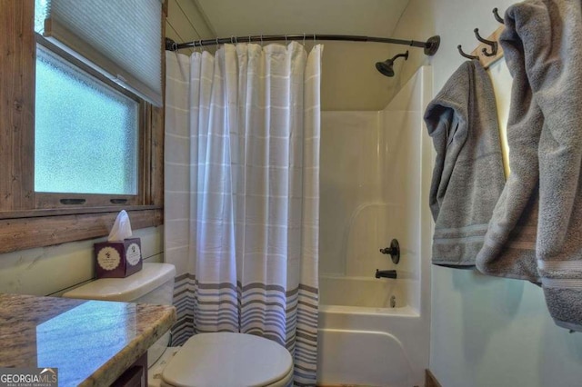 full bathroom with vanity, toilet, and shower / tub combo