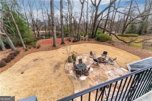 9135 Etching Overlook, Johns Creek, GA 30097 - view of yard featuring an outdoor fire pit, a patio area, and view of scattered trees